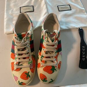 Gucci Ace  Strawberry Print Sneakers - Cream, Green, Red
Limited edition.